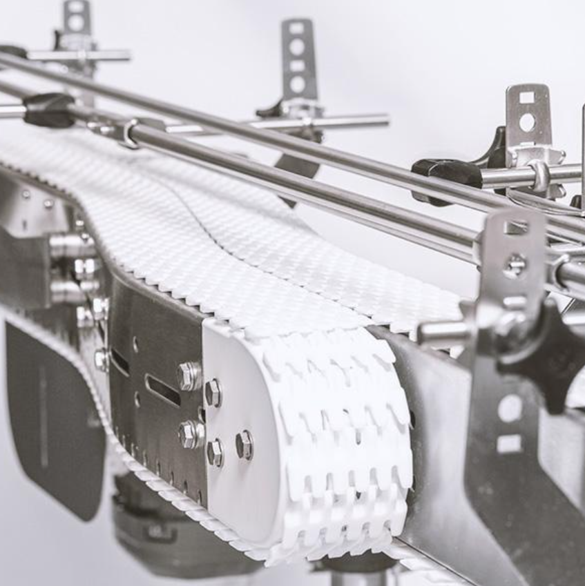 Plastic chain conveyor systems